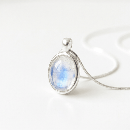 Rainbow moonstone pendant on silver chain